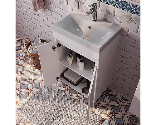 Заказать Тумба с раковиной Iddis Zodiac 50 ZOD5CDFi95K Белая в магазине сантехники Santeh-Crystal.ru